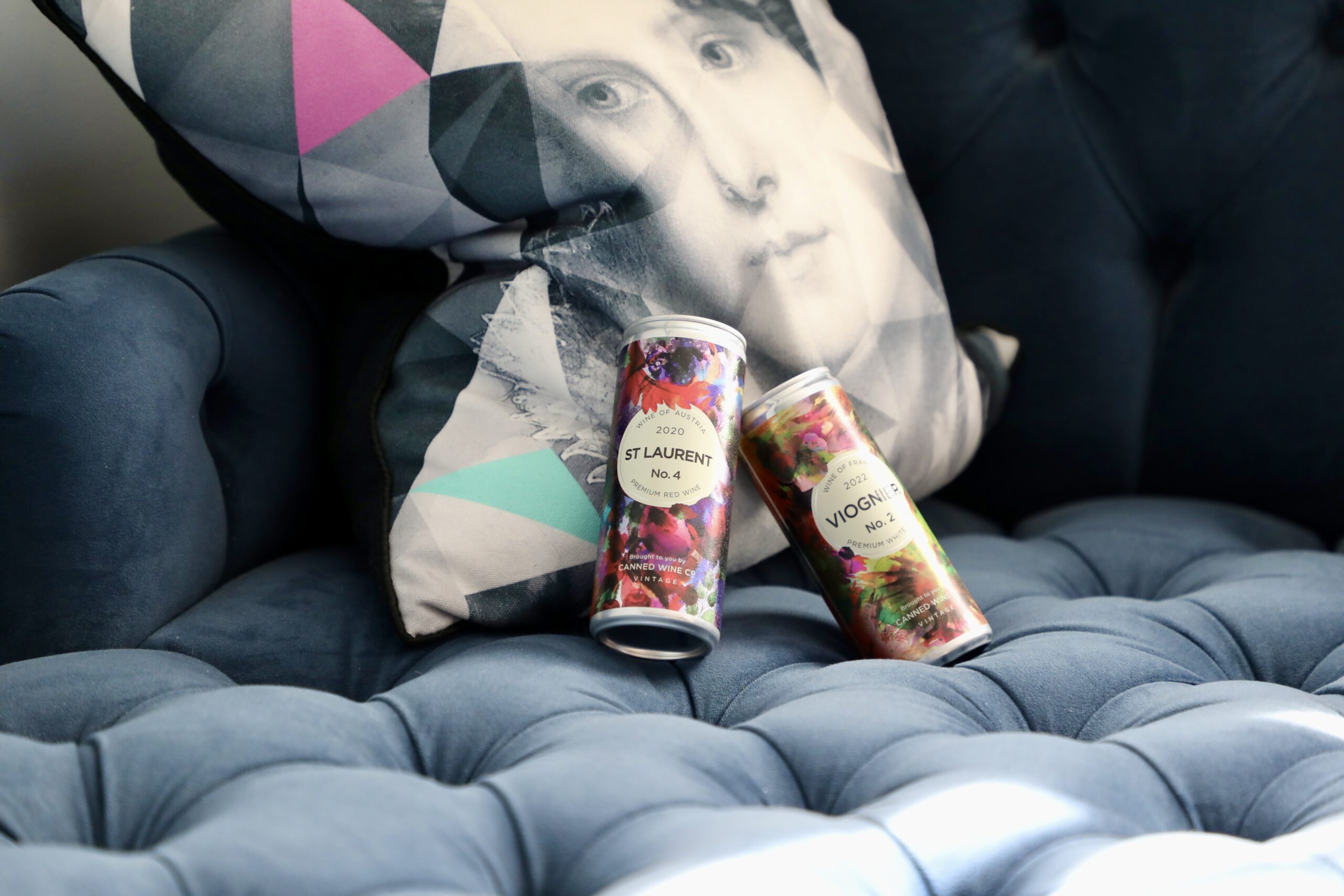 Our wines in can at Hotel Indigo in Bath, positioned on the sofa.