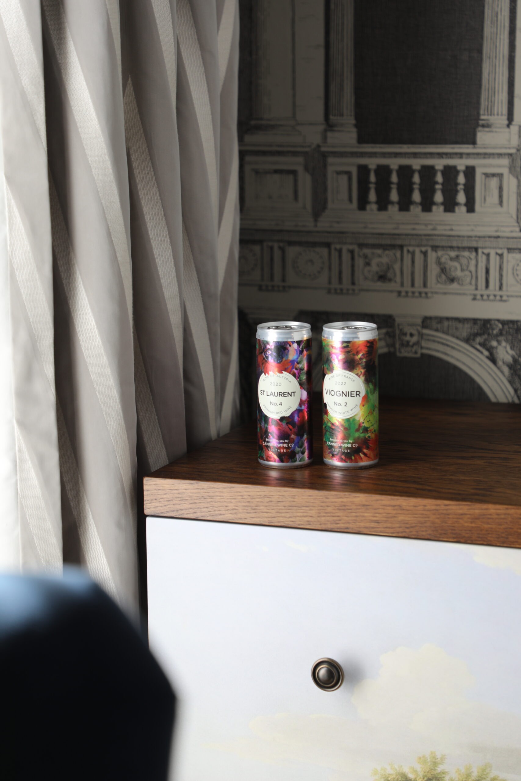 Wines in can available on the side table at Hotel Indigo Bath.