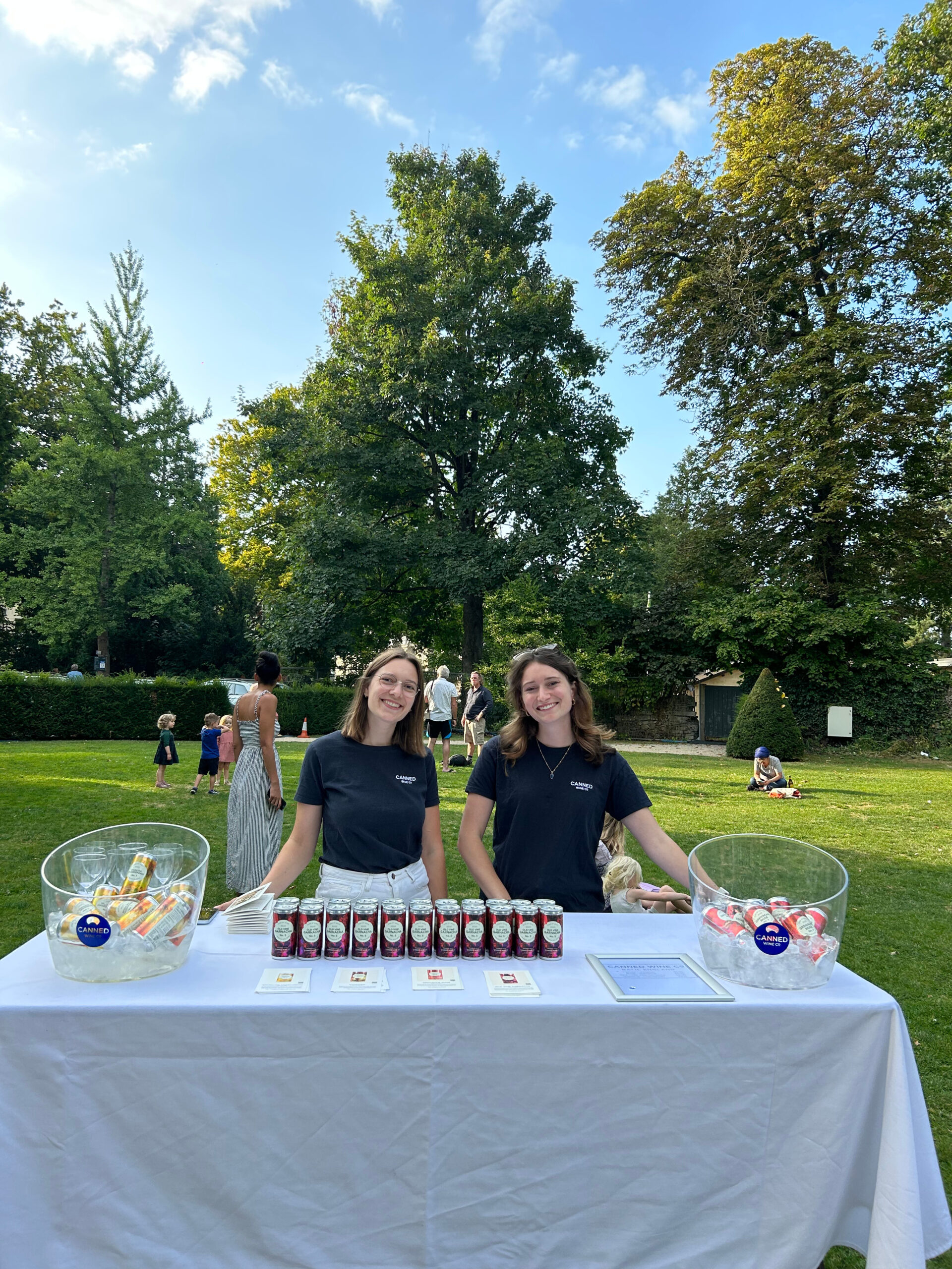 Marieke and Elena sharing wines in the Holburne Cafe gardens.