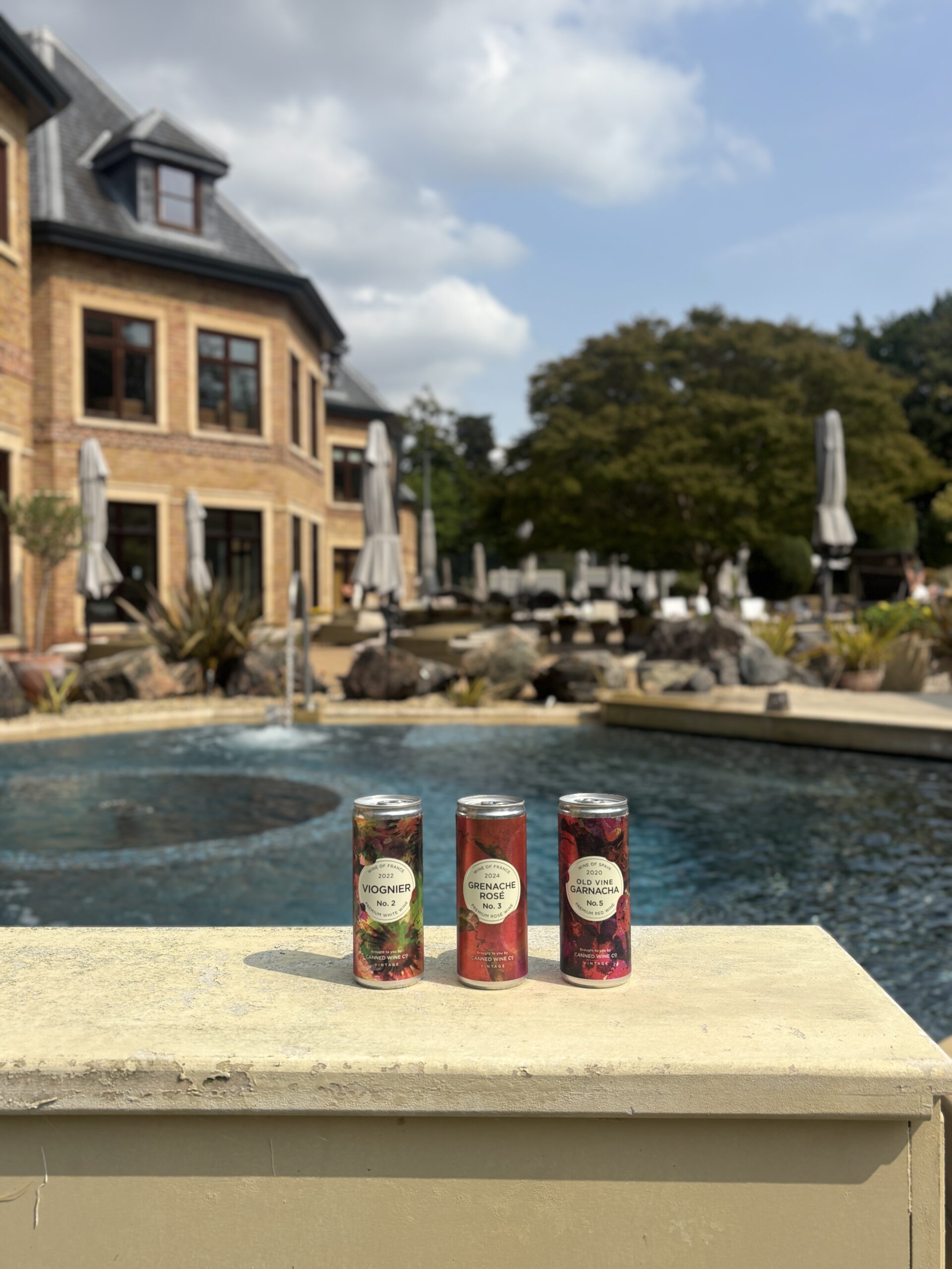 Canned Wine Co. range in the gardens for enjoying poolside at Pennyhill Park Hotel.