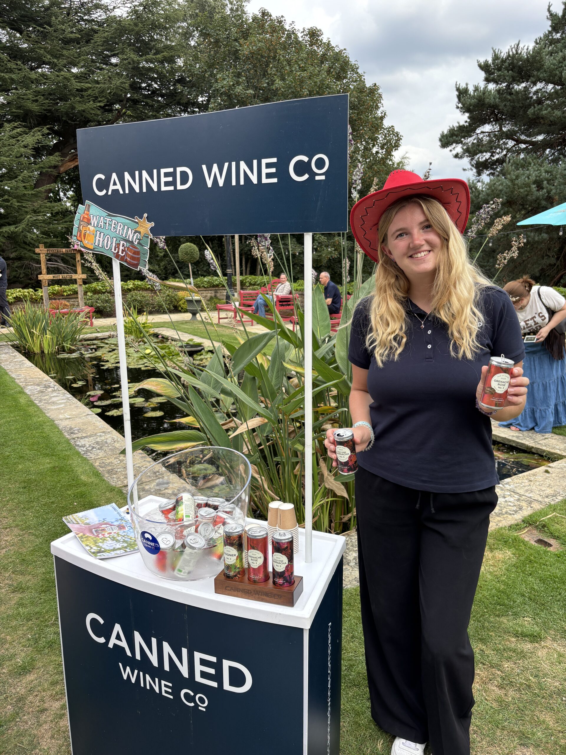 Milly presents Canned Wine Co. at a Pennyhill Park family fun day.